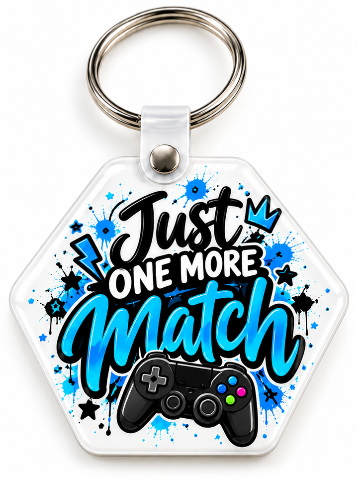 Just One More Match Keychain novelty keychain mockup featuring gaming-themed lettering, product view 4